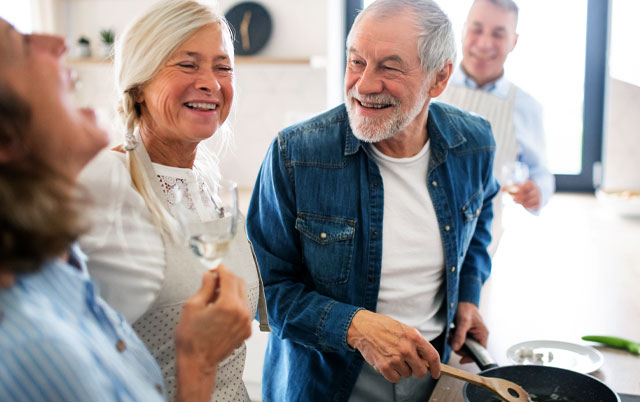 A group of people talking and laughing